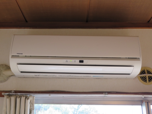Wall mounted AC Unit above the window