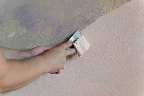 Removing Loose Materials by Putty Knife