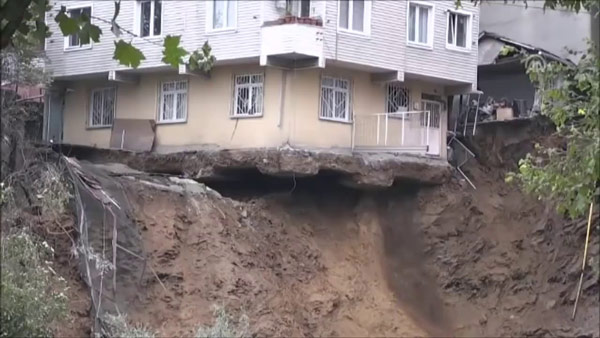 House and Soil Collapse Due to Excavation