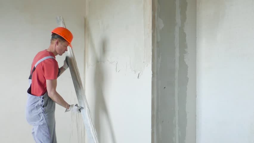 Application of Gypsum Plaster on Wall