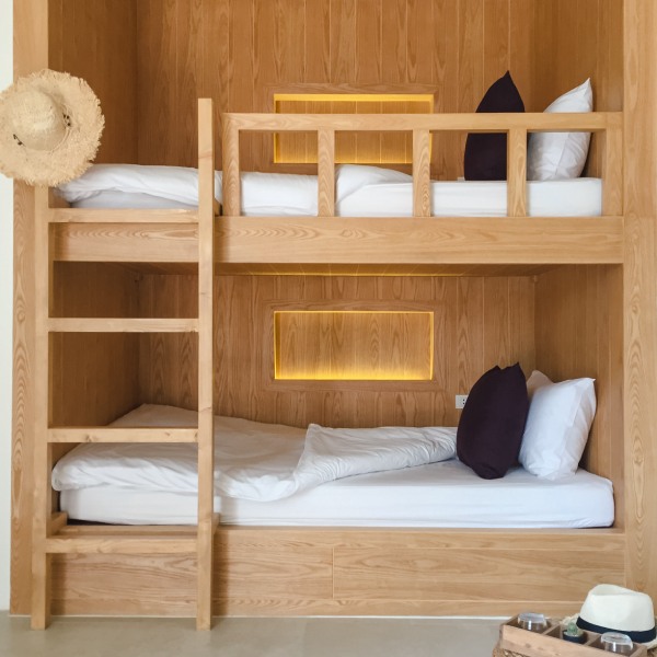 Wooden Bunk Beds with white cushions