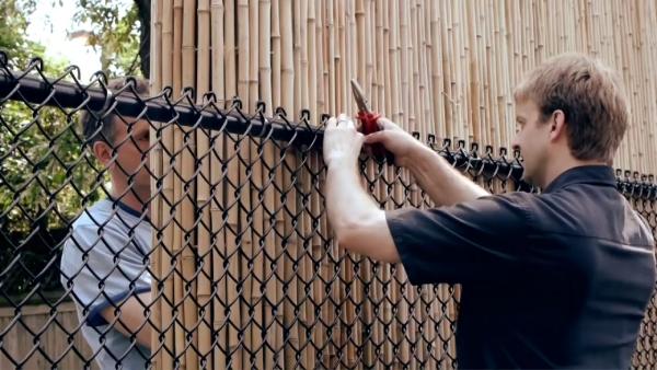 Bamboo Fence Installation on Existing Chain Link Fence