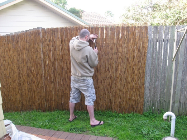 Bamboo Fence Installation on Existing Wooden Fence