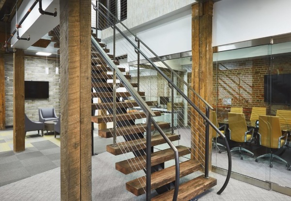 Wooden stairs with metal mono stringer and balustrade