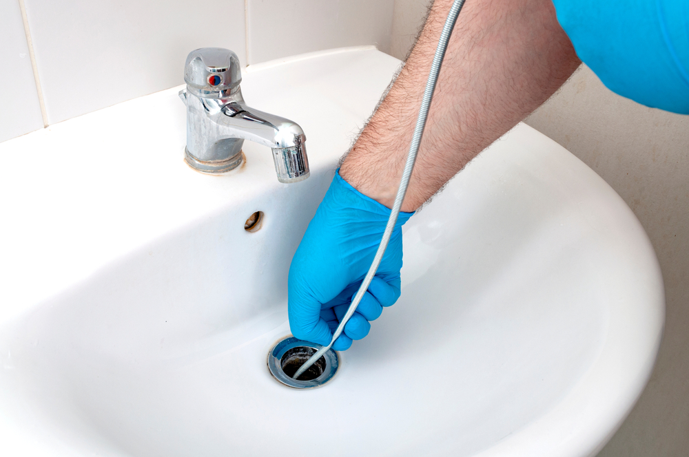 Drain Unclogging with Plumber's Snake