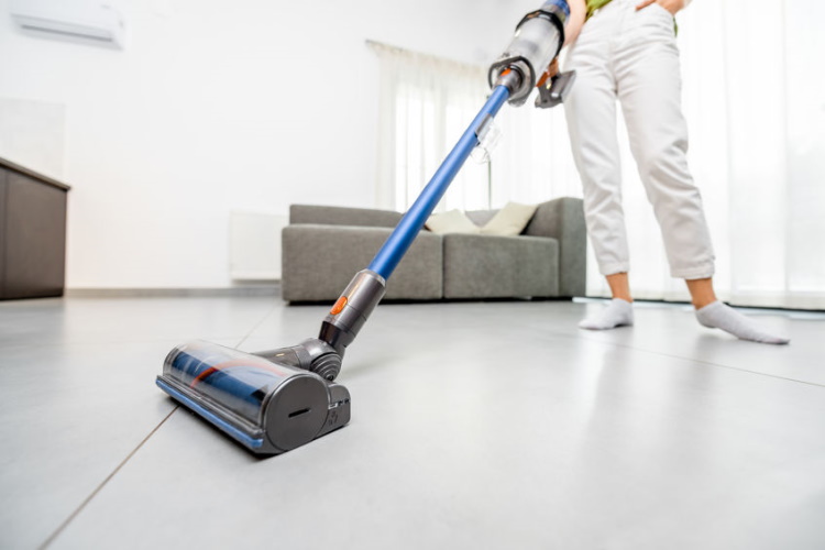 Cleaning Tiles Floor using Vacuum Cleaner