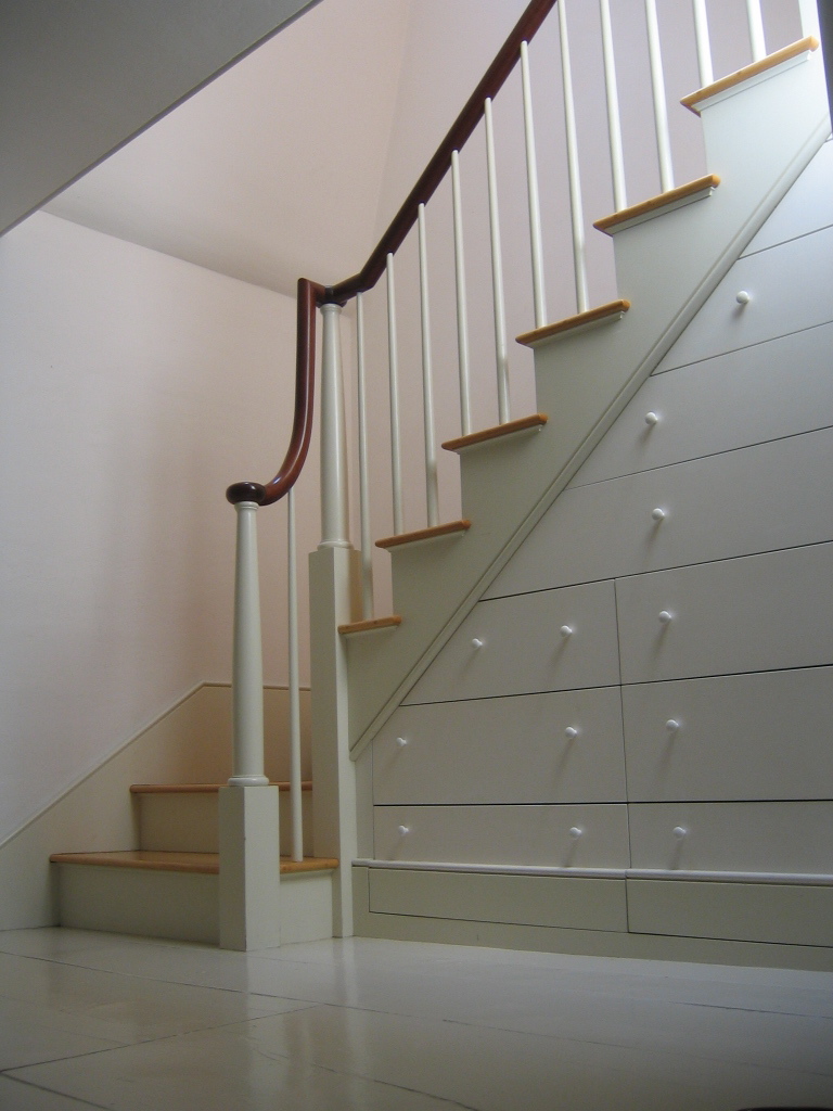 Install Drawers below the Staircase to Keep Confidential Items