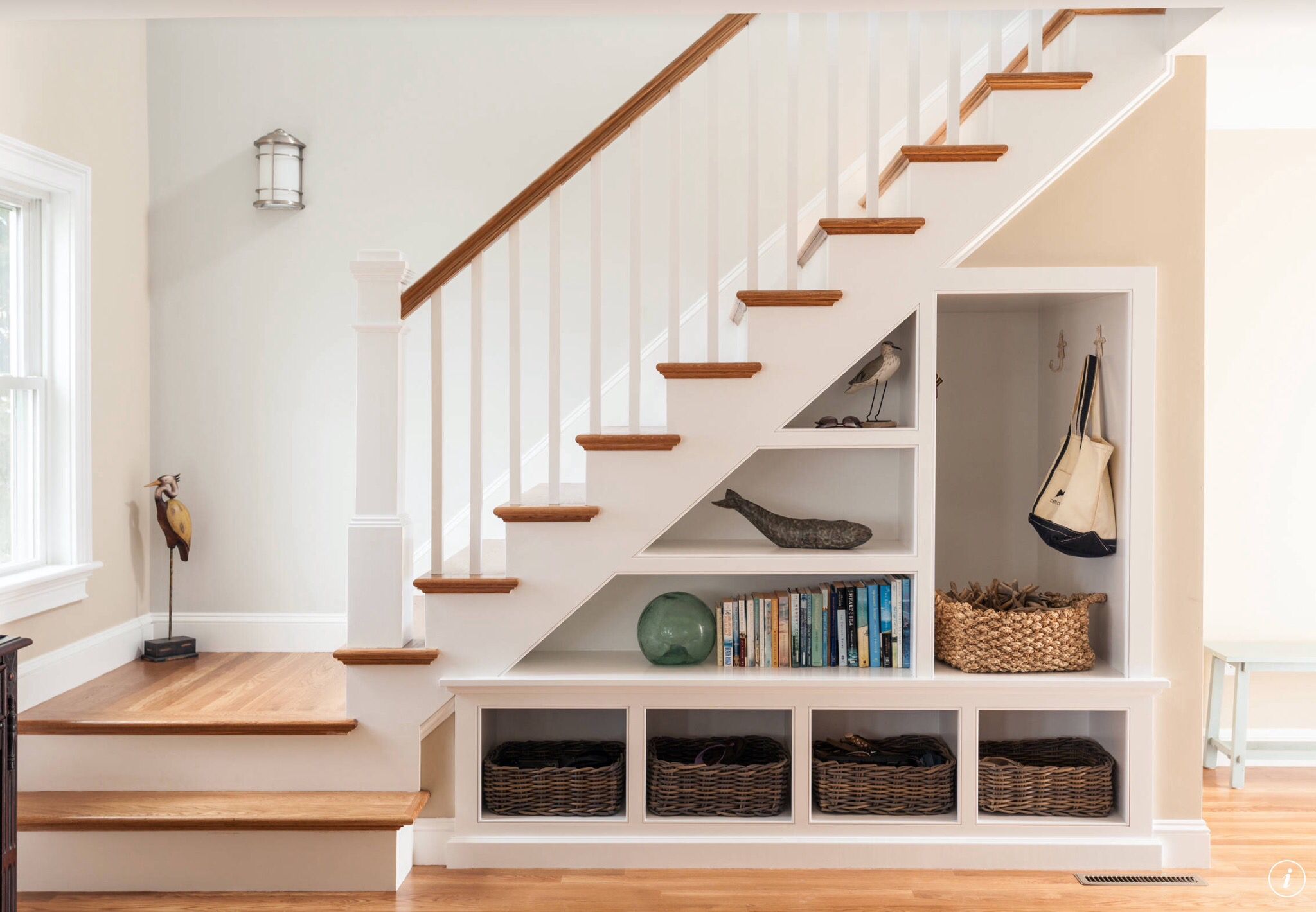 Store Showpieces by Adding Table or Shelf Beneath the Stair