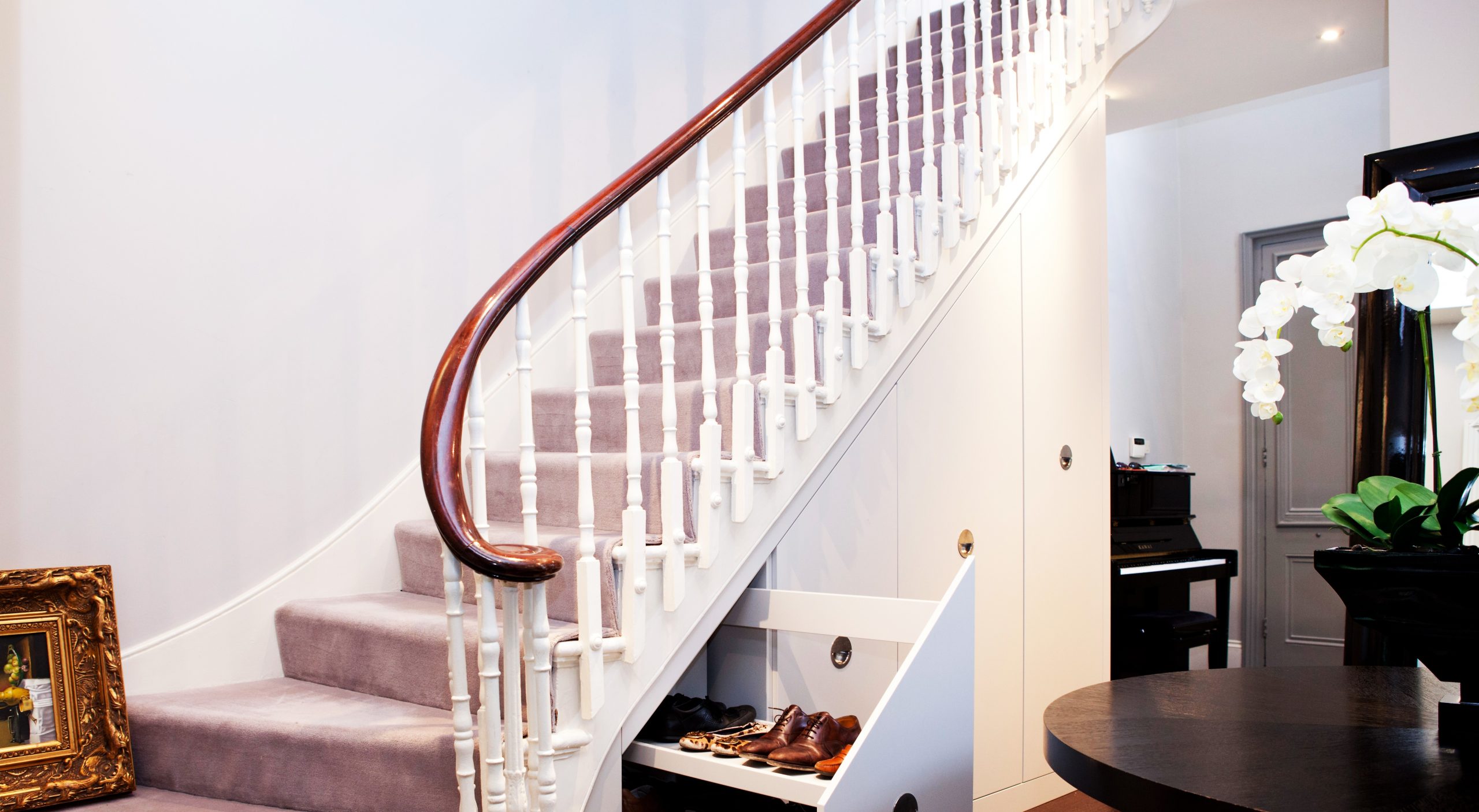 Using a Space below the Stair as a Shoe Rack is also one of the Good under Stair Storage Idea