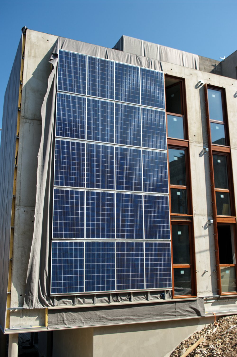 Photovoltaic Glazing as Building Facades